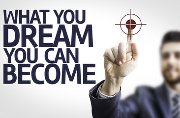 Business man pointing: What You Dream You Can Become