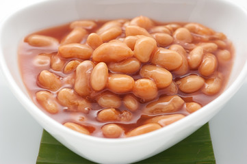 Canned beans on white plate