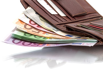 Wallet with euro banknotes on white
