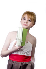 beautiful  blonde with bright green gift on white background