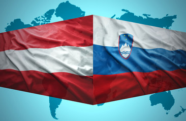 Waving Slovenian and Austrian flags