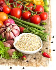 Raw organic quinoa and vegetables