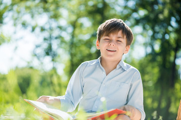 Boy in summer park