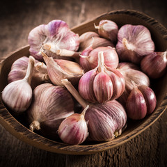 garlic bulb on rustic wooden background