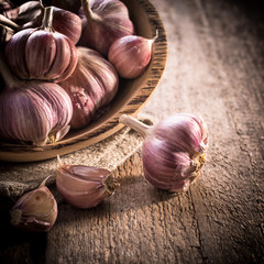 garlic bulb on rustic wooden background