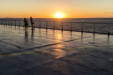 Fototapeta na wymiar sunset on ferry boat