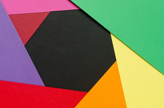 colorful paper sheets forming an aperture like shape