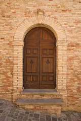 old door of wood in Castle of Gradara