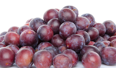 Heap of fresh ripe blue plums