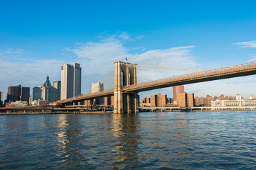 Fototapeta premium Brooklyn bridge in New York on bright summer day