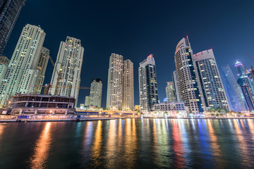 Dubai marina skyscrapers during night hours