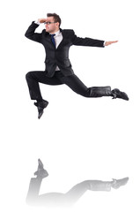 Jumping businessman isolated on the white