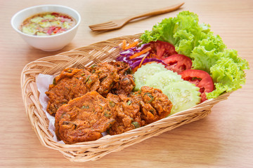 Fried fish cake and vegetables in basket, Thai food
