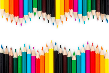 close up Colour pencils wave shape isolated on white background