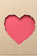 Naklejka na ściany i meble Grunge heart on ragged cardboard background