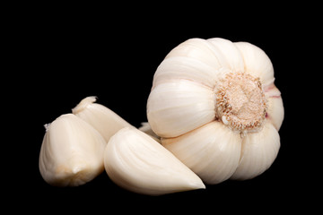 Garlic vegetable on black