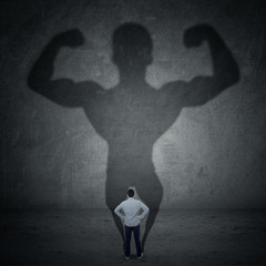 Businessman and strong shadow 3