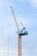 Yellow crane in a construction site