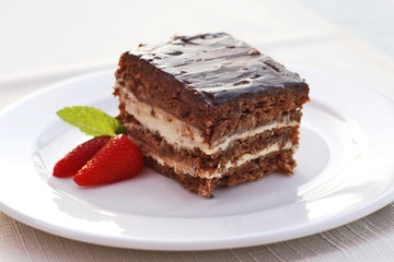 Chocolate cake with strawberries and mint