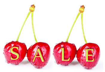 Sale concept. Ripe sweet cherries, isolated on white
