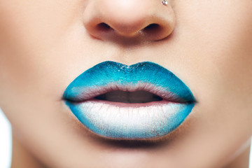 Macro photo of womans lips with lipstick