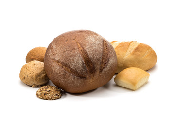 assortment of baked bread in basket on white background