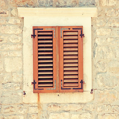 Fototapeta na wymiar Vintage image with window and shutters