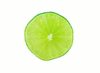 Abstract green background with citrus-fruit of lime slices