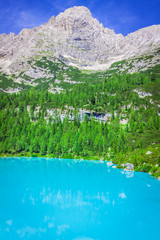 Turquoise Sorapis Lake  in Cortina d'Ampezzo, with Dolomite Moun