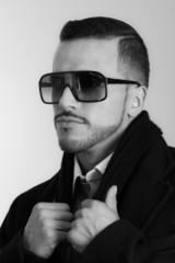 Closeup portrait of handsome elegant young hispanic man