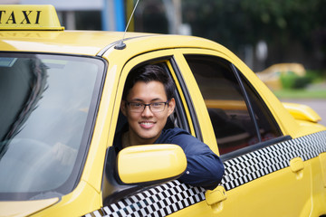 Portrait taxi driver smile car driving happy
