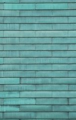 Rows of green metal panels usable as background or texture