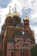 Fototapeta na wymiar construction of a new orthodox church, finishing works