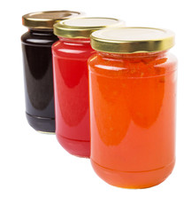 Blueberry, strawberry and orange fruit open lid bottled jam 