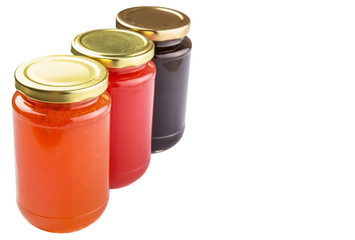 Blueberry, strawberry and orange fruit open lid bottled jam 