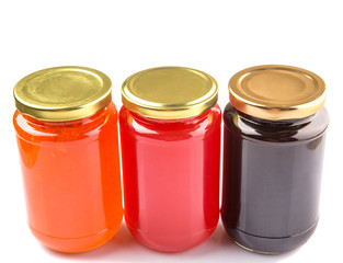 Blueberry, strawberry and orange fruit open lid bottled jam 