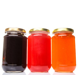 Blueberry, strawberry and orange fruit open lid bottled jam 