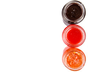 Blueberry, strawberry and orange fruit open lid bottled jam 