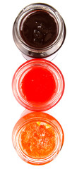 Blueberry, strawberry and orange fruit open lid bottled jam 