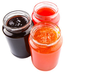 Blueberry, strawberry and orange fruit open lid bottled jam 
