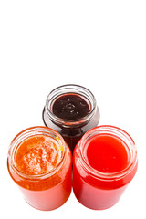 Blueberry, strawberry and orange fruit open lid bottled jam 