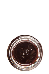 Bottled blueberry jam over white background