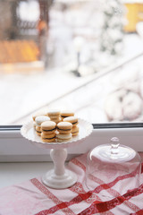 Coffee and sweets on the window