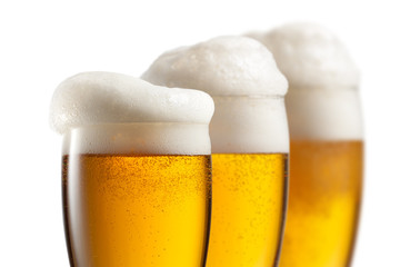 Beer in glasses isolated on white