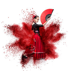 Fototapeta premium young woman dancing flamenco against explosion