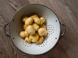 washed  new potatoes in a collander