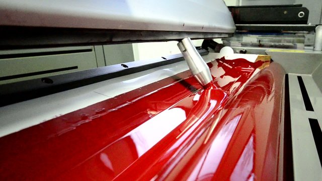 Red on the offset  print press machine wide angle