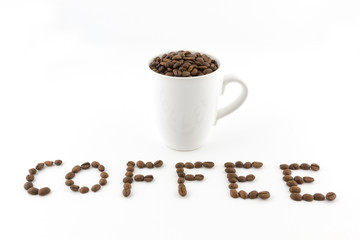 Roasted coffee beans in a cup with name