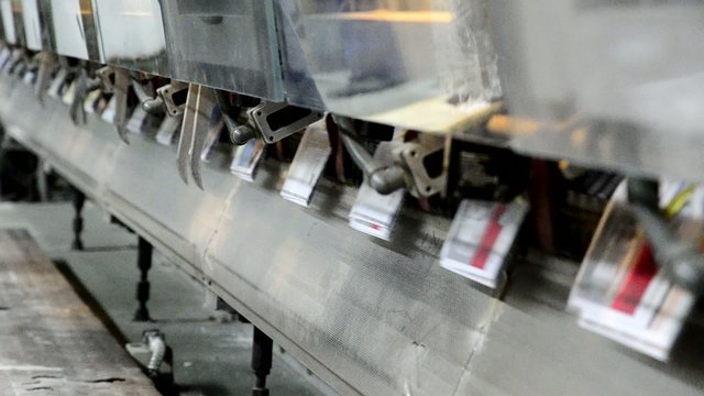 conveying process of a full-automatic stitching unit