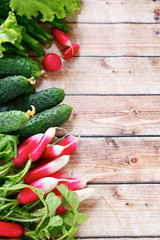 cucumbers and radishes on the boards